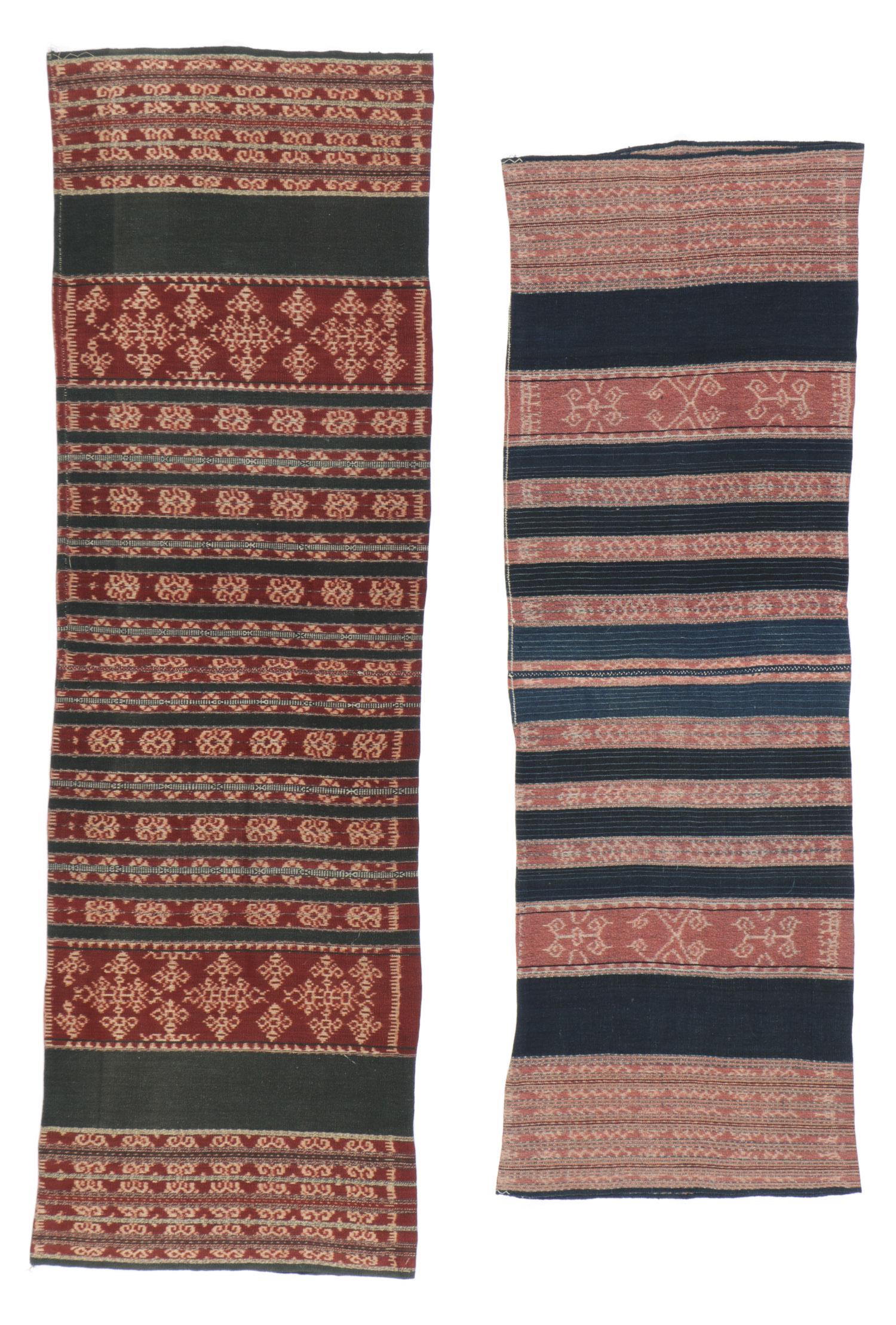 Two Indonesian Savu Ikat Sarongs: Two Indonesian Savu Ikat Sarongs. Hand spun cotton ikat ceremonial tube skirts, "The Greater Blossom" moiety, Savu. Sizes: 1) 67'' x 21'' (170 x 53 cm); 2) 58'' x 19'' (147 x 48 cm). Provenance: Apsar