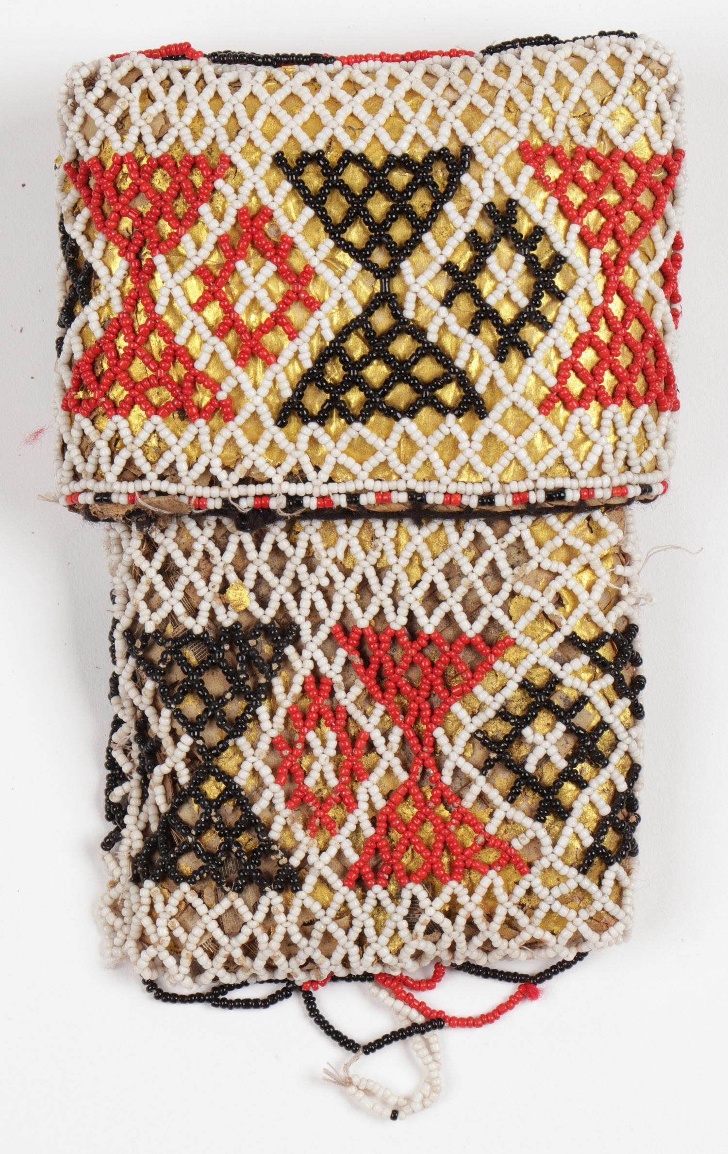 Antique Sumatran Man's Tobacco Pouch: Antique Sumatran Man's Tobacco Pouch. Plaited pandanus leaves, glass beads, traces of fold leaf, Angkola Batak people, Sumatra. Tobacco Pouch size: 8'' x 5'' (20 x 13 cm). Provenance: Apsara Arts of A