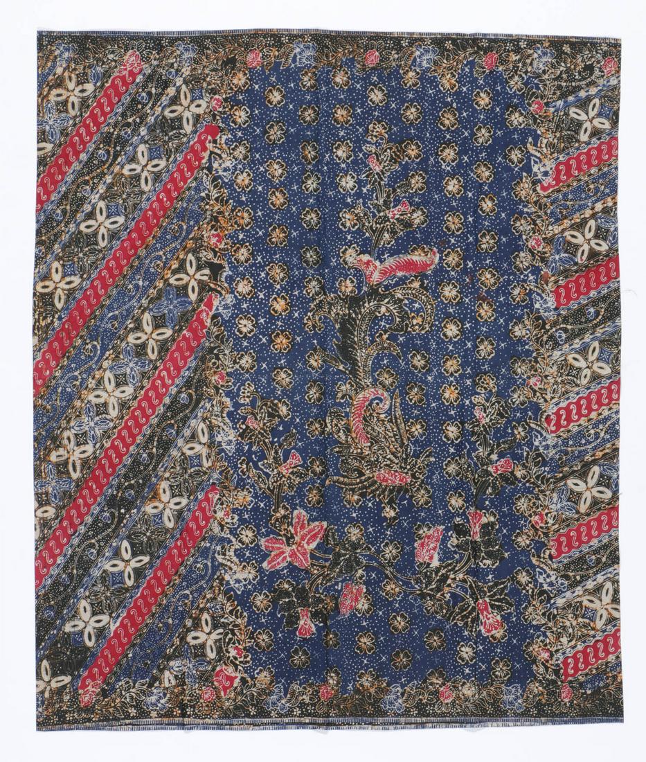 Old Indonesian Batik Closed Sarong: Old Indonesian Batik Closed Sarong. In dark red, very dark indigo and ochre on cream background. Badan with a diagonal pattern and kepala of flowers on a "starry sky" background pattern. Size: 41'' x 