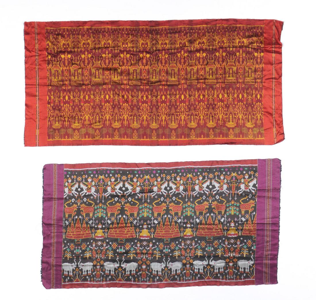 2 Cambodian Silk Ikat Textiles (Pidan), 20th c.: 2 Cambodian silk ikat textiles (pidan) with temple, animal and human figures, 20th c. Sizes: 1) 38'' x 71'' (97 x 180 cm); 2) 38'' x 76'' (97 x 193 cm). Provenance: Private South Carolina Collection. 