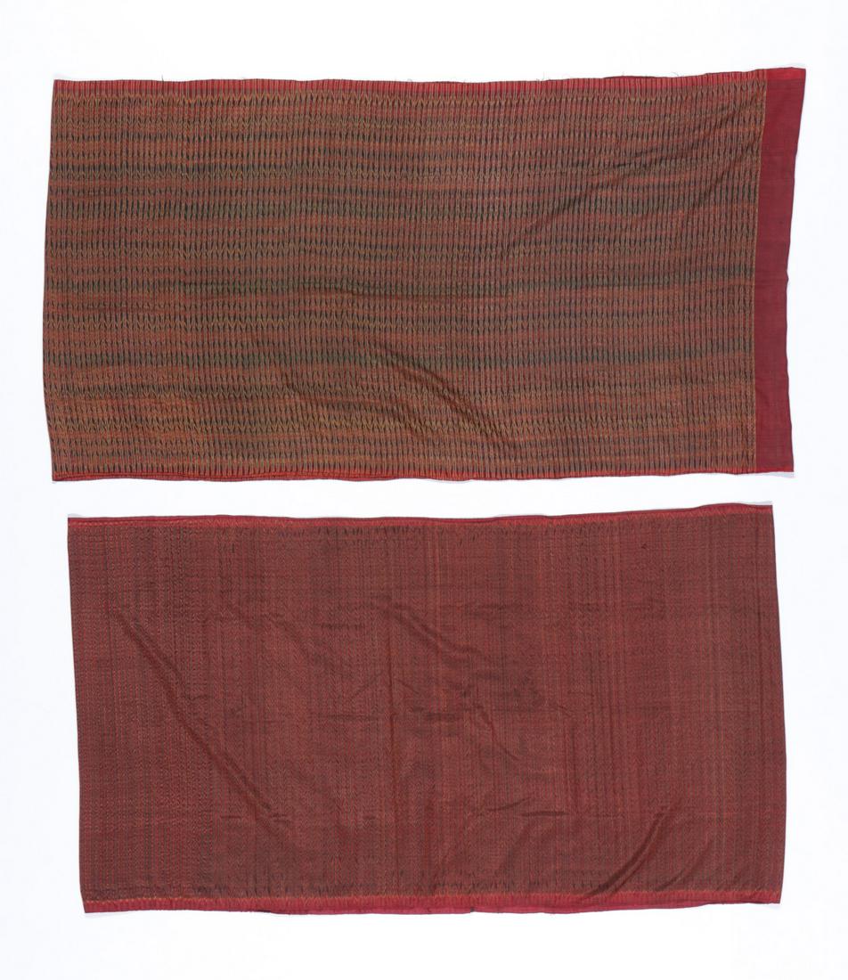 2 Cambodian Silk Ikat Hipwrapper Textiles: 2 Cambodian silk ikat hipwrapper (samphot hol) textiles with ends sewn together to make tube skirt. Sizes: 1) 33.75'' x 62'' (86 x 157 cm); 2) 31.5'' x 58'' (80 x 147 cm). Provenance: Private South Ca