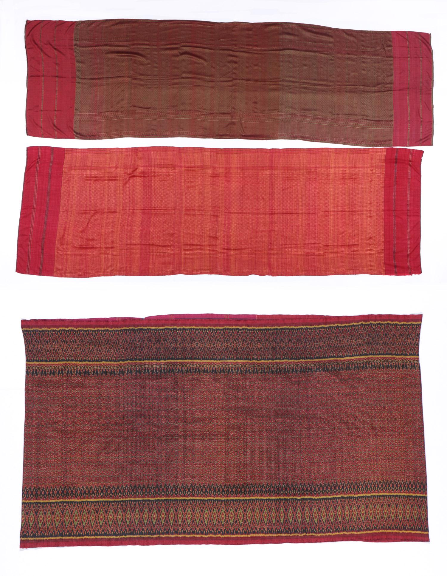 3 Cambodian Silk Textiles, early/mid 20th c.: 3 Cambodian Silk Textiles including 2 Samphot Pamuong weft faced twill, one gold and red, one with three thread technique resulting in a green and red pattern on one side and a primarily green pattern