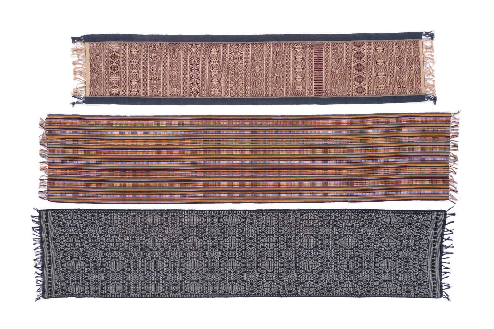 3 Handwoven Philippine Textiles/Tablerunners: 3 handwoven Philippine textiles/tablerunners, one from Yak An people, Basilian Island, Mindanao Island, Philippines, 20th c. Sizes: 1) 12.75'' x 61'' (32 x 156 cm); 2) 16'' x 73'' (41 x 185 cm); 3) 16