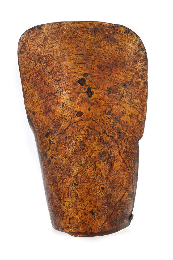 15th-16th Century Leather Armor Arm Covering: 15th-16th Century Leather Armor Arm Covering.Incised leather and gilt. Size: 10.5'' x 6.25'' x 4.5'' (27 x 16 x 11 cm).