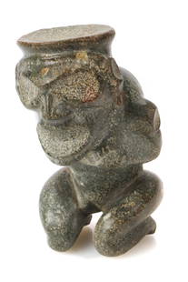 Taino Rare Cohoba Stand Depicting Yacahu (1000-1500 CE): Taino. An exceedingly rare cohoba stand depicting Yacahu the supreme male god. The head has an expressive face and is kneeling and free standing. Cohoba stands were used to distribute the