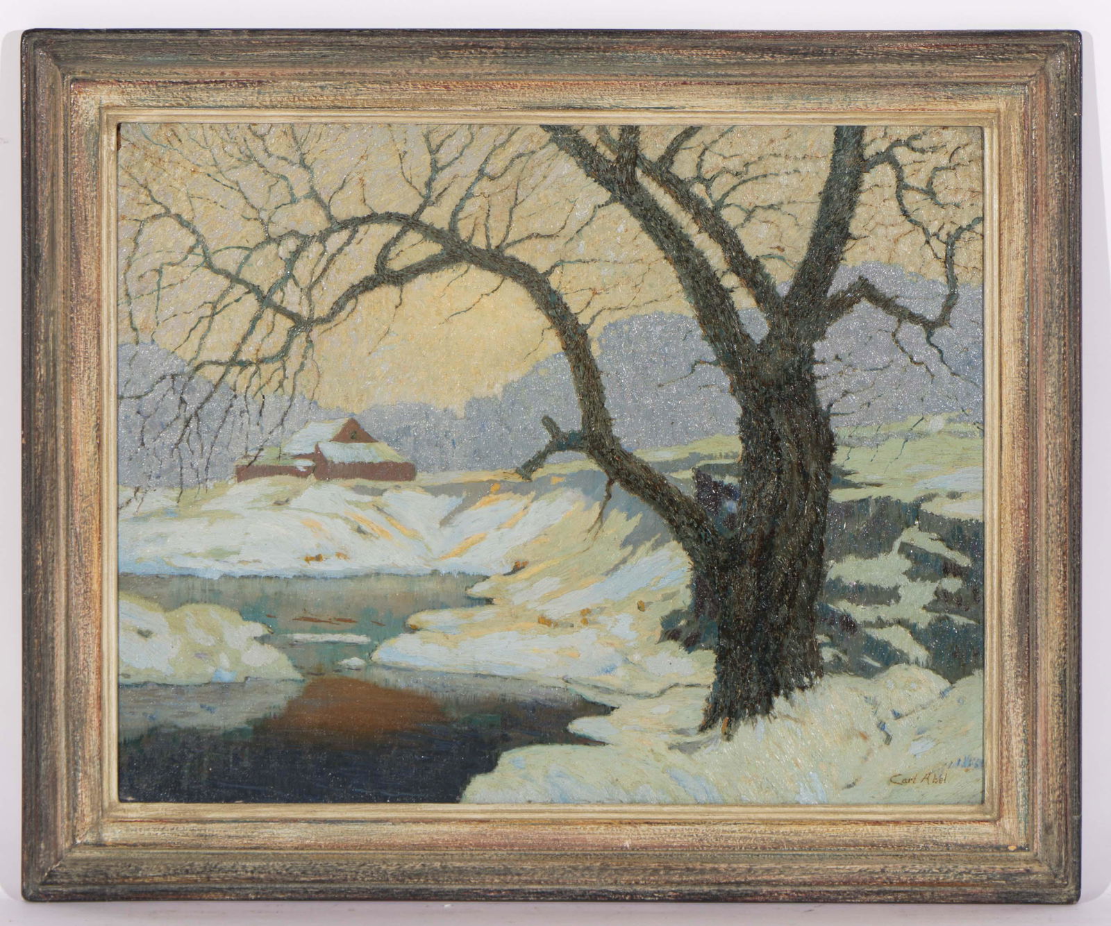 Carl Abel (American, 1875-1959) Oil Painting: Carl Abel (American, 1875-1959) Untitled (Tree by Stream in Snow) oil on canvas, signed. Framed. Size: 14'' x 17.5'', 36 x 44 cm (sight); 18'' x 21.5'', 46 x 55 cm (frame).