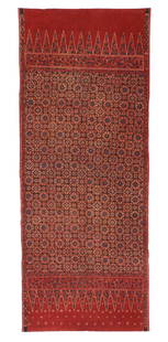 Antique Tulis Batik Skirt Cloth, Indonesia, 19th C.: Kain panjang, skirt cloth of commercial tabby cotton with wax resist decoration in handdrawn (tulis) wax resist (batik) in a geometricized eight-petalled floral or Greek cross design in red and blue