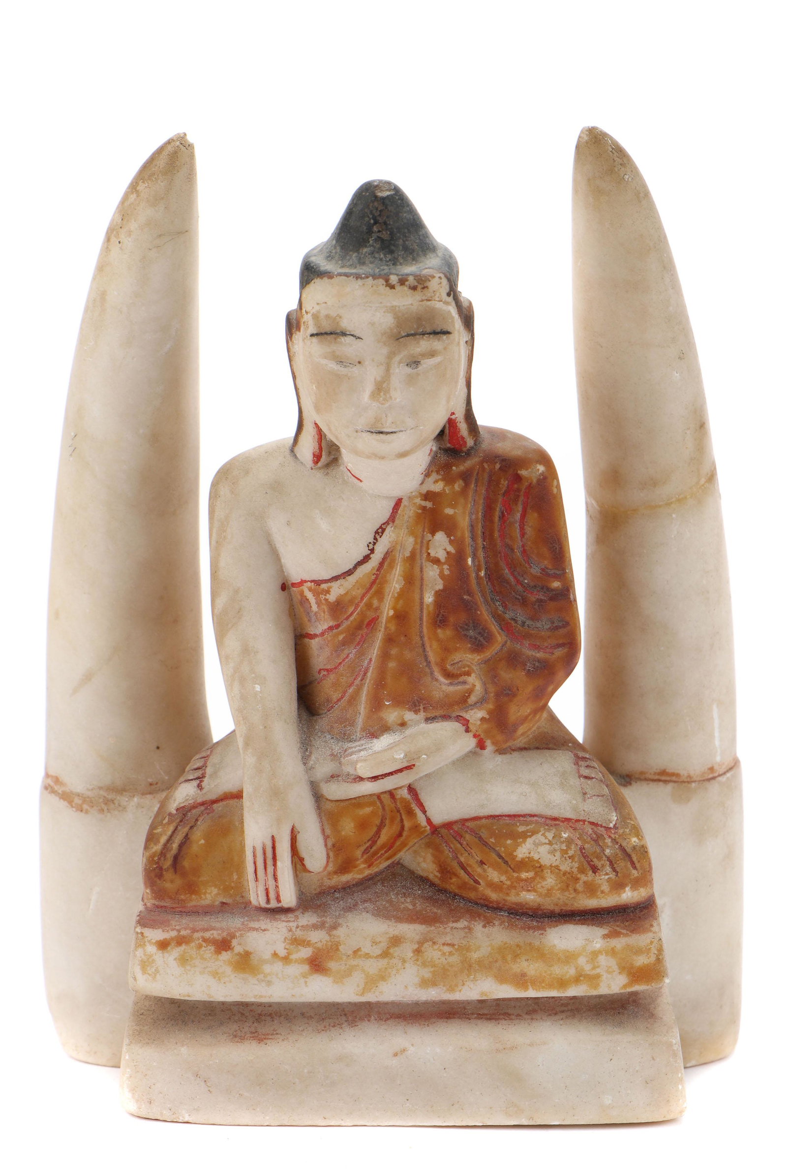 Painted Stone Buddha, Burma, early/mid 20th century: Painted stone Buddha, Burma, early to mid 20th century (repairs). Size: 7.25'' x 5.25'' x 2.5'' (18 x 13 x 6 cm).