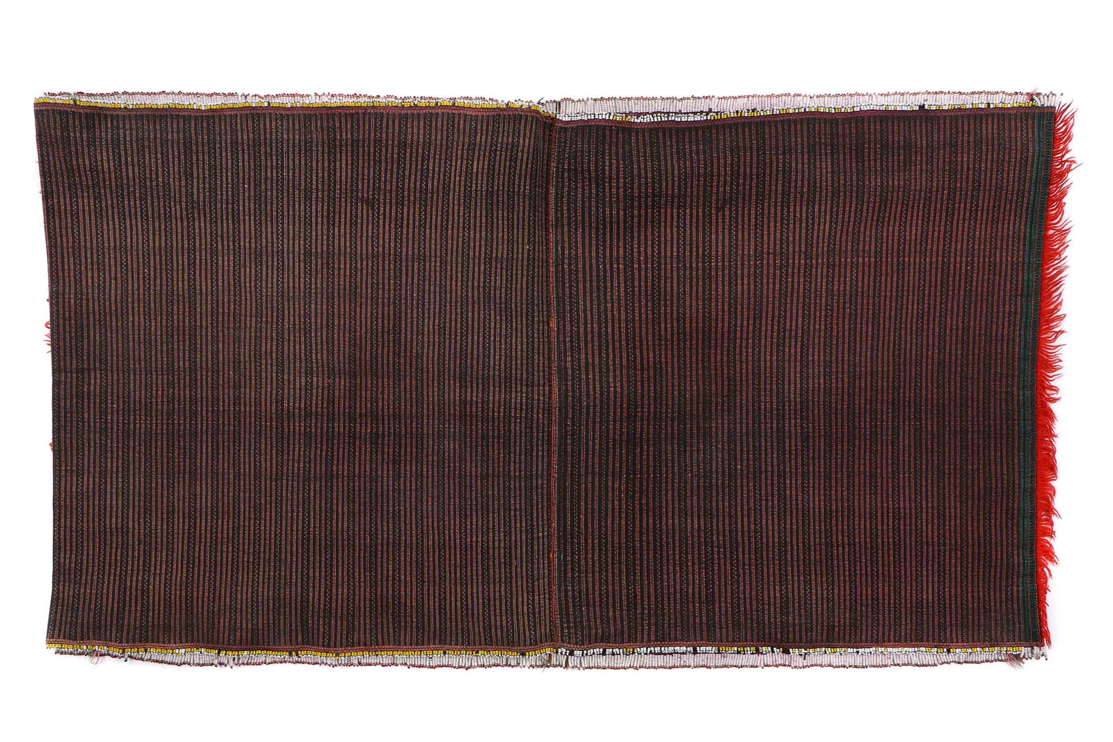Khumi Tubular Skirt, Chin, Burma: Khumi tubular skirt embellished with columns of tiny glass beads, Chin, Burma, circa mid-20th century. Uncut. Size: 20'' x 36'' (51 x 91 cm).