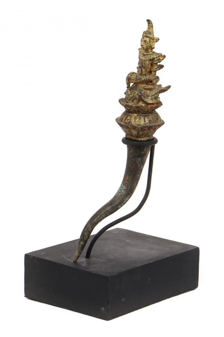 Antique Thai Gilt Bronze Attendant: Antique Thai Gilt Bronze Attendant, on stand. Size: 10.5'' x 2.25'' x 5'' (27 x 6 x 13 cm) Height on Base: 12.5" (32 cm). Provenance: Private New Jersey Estate; acquired from from Francois Villaret, U