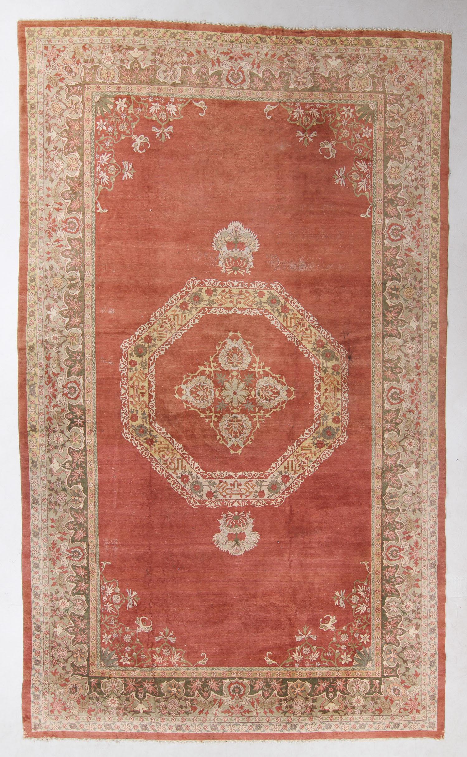 Agra Rug, India, Mid 20th C., 10'1'' x 16'10'': Agra Rug, India, Mid 20th C., 10'1'' x 16'10'' (307 x 513 cm). Weight: 70 lbs. Material: wool pile, cotton warp, cotton weft. Note: There Are No Hidden or Confidential Reserves in this Auction; All Ac
