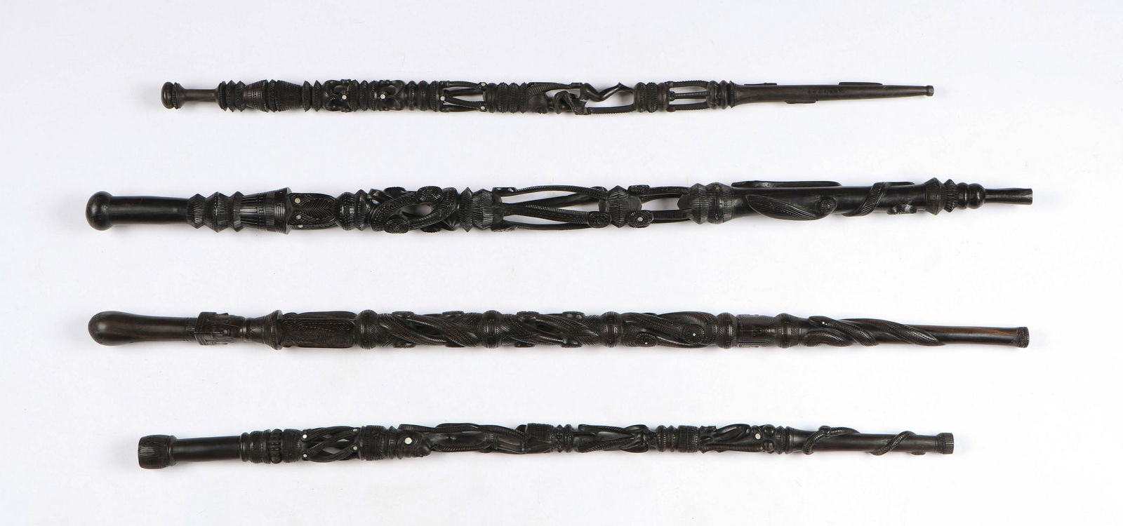 Four Trobriand Staffs or Walking Sticks, PNG. (1 of 8)
