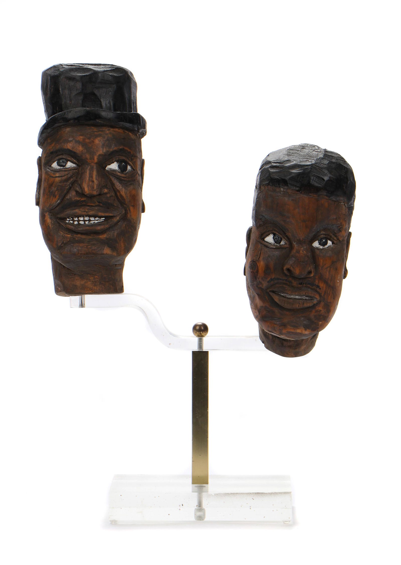 Charles Gillam (Amerian, b. 1945) Portrait Heads: Charles Gillam (American, b. 1945) Portrait Heads of Elmore James and Willie Dixon, carved and paint-decorated wood, each signed and titled; with custom plexiglass stand. Sizes: 1): 8'' x 5'' x 4'' (2
