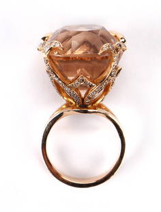 Authenticated Original Dorota "Princess Ring": Authenticated original Dorota "Princess Ring," 18k rose gold setting with large champagne color topaz with fancy color champagne diamonds and white diamonds, 42.15 cts. Diameter: .75" (2 cm); Stone