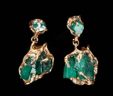 Handcrafted 14kt Yellow Gold & Emerald Earrings: Handcrafted 14kt yellow gold earrings, with synthetic green emerald crystals. Each Size: 1.25'' x .75'' x .25'' (3 x 2 x 1 cm). Weight: 16.9 g. Provenance: Estate of Aviva and Jack Robinson,