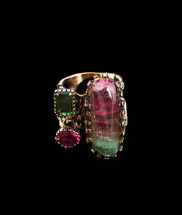 Handcrafted 14kt Gold and Tourmaline Ring: Handcrafted 14k gold ring with an elongated watermelon tourmaline, a rectangular green tourmaline and an oval pink tourmaline. Diameter: .75" (2 cm); Stone portion: .5'' x 1'' x .75'' (1 x 3 x 2 cm).