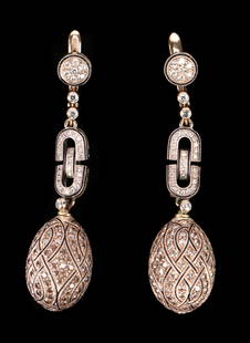 14kt Yellow Gold Diamond Drop Earrings: 14kt yellow gold diamond drop earrings marked 585 960 and an unidentified hallmark. Weight 18.24 g. Each Size: 2.25'' x .5'' (6 x 1 cm). Provenance: Estate of Aviva and Jack Robinson, Bloomfield