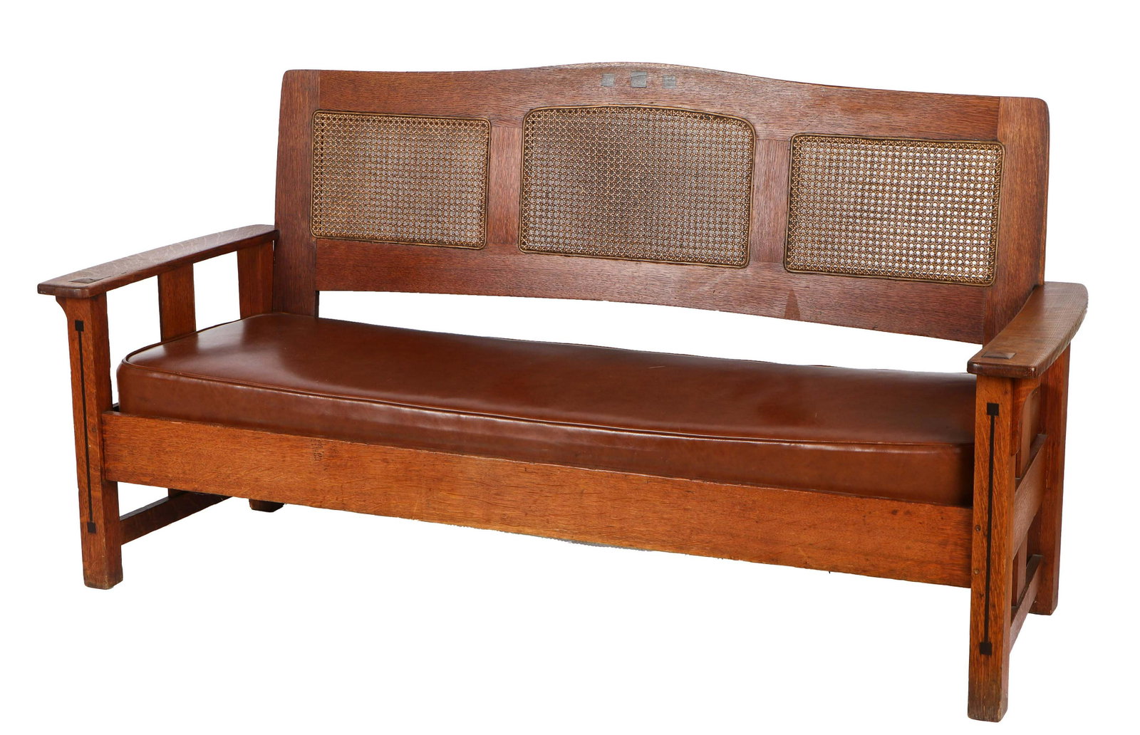 Charles P. Limbert, Co. Arts & Crafts Eben-Oak Settee: Charles P. Limbert, Co. Arts & Crafts Eben-Oak Settee. Oak, ebony and cane, branded signature. Size: 38'' x 74'' x 27.5'' (97 x 188 x 70 cm).