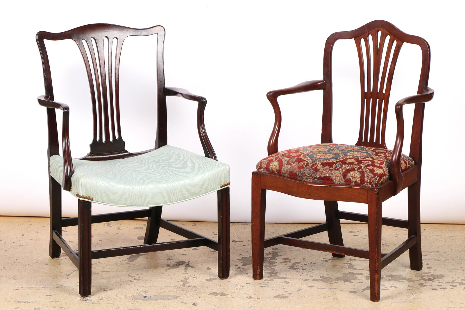 Two Chippendale Mahogany Armchairs: Two Chippendale Mahogany Armchairs. Size: 1) 37'' x 22'' x 19'' (94 x 56 x 48 cm); 2) 36'' x 23'' x 21'' (91 x 58 x 53 cm).