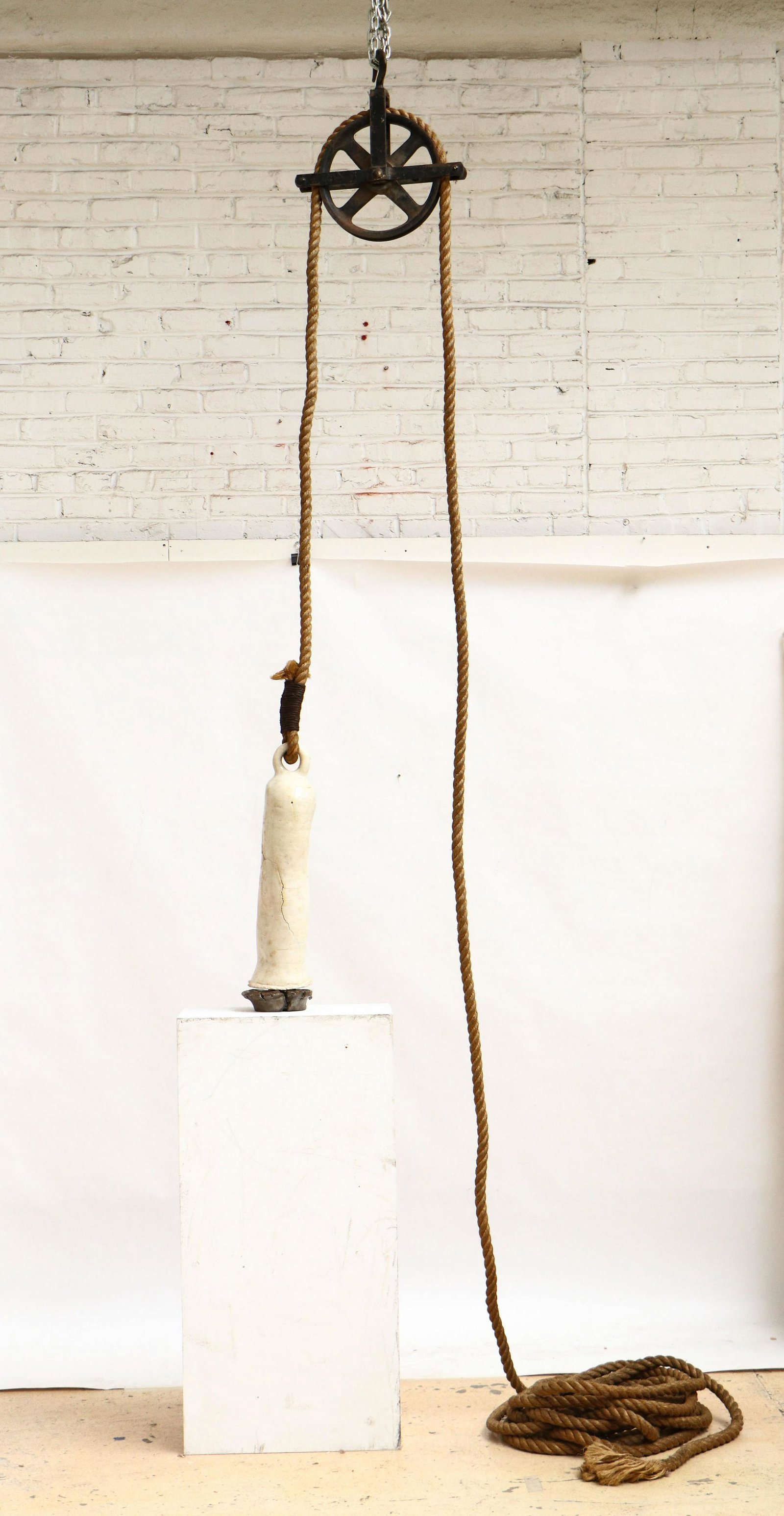 Vladimir Salamun (American, b.1942) Sculpture,: Vladimir Salamun (American, b.1942) "The Dropper," mixed media sculpture, rope, iron and ceramic (repaired). Size: ceramic: 22'' x 6'' x 6'' (56 x 15 x 15 cm); rope: 360'' x '', 914 x cm (approximatel