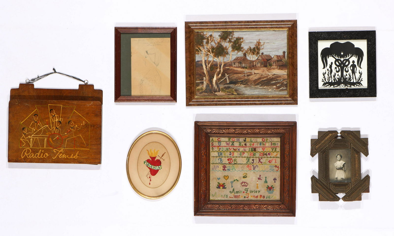 American Folk Art Collector's Lot: American Folk Art Collector's Lot. Including a tramp art frame with photograph, needlepoint dated 1878, drawings, mixed media collage by Phyllis Glasson, a painted letter box, and a framed scherenschn