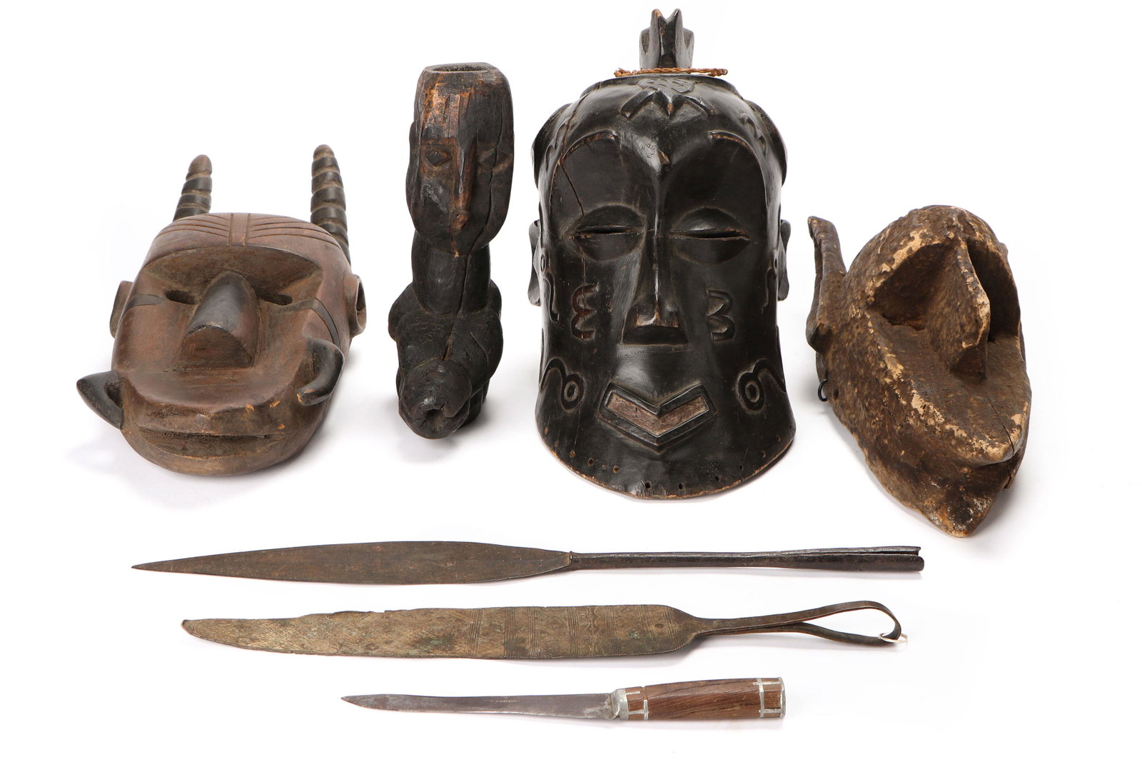 Collector's Lot of African Masks, Figure and Knives: Collector's Lot of African Masks, Figure and Knives. Sizes ranging from: : 1'' x 11'' x .5'' (3 x 28 x 1 cm) to 14'' x 13'' x 9'' (36 x 33 x 23 cm).