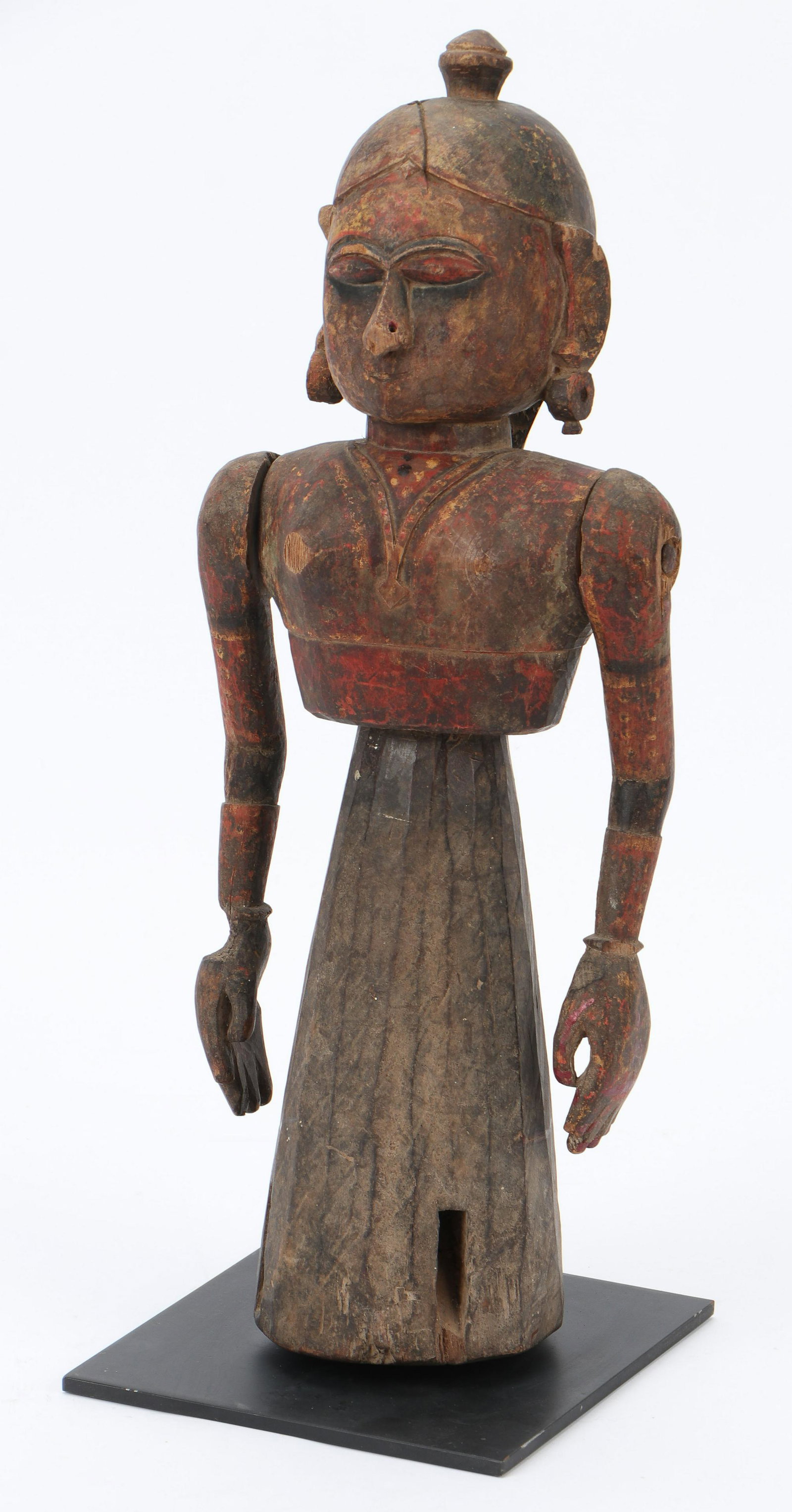 Rajasthan Gangaur Festival Doll of Gauri, Early/Mid: Early Rajasthan Doll with movable arms crafted for the celebration of Gangaur in Rajasthan. The doll depicts Gauri. Early to mid 20th century. Carved wood and pigment. Size: 19'' x 7'' x 5'' (48 x 18 
