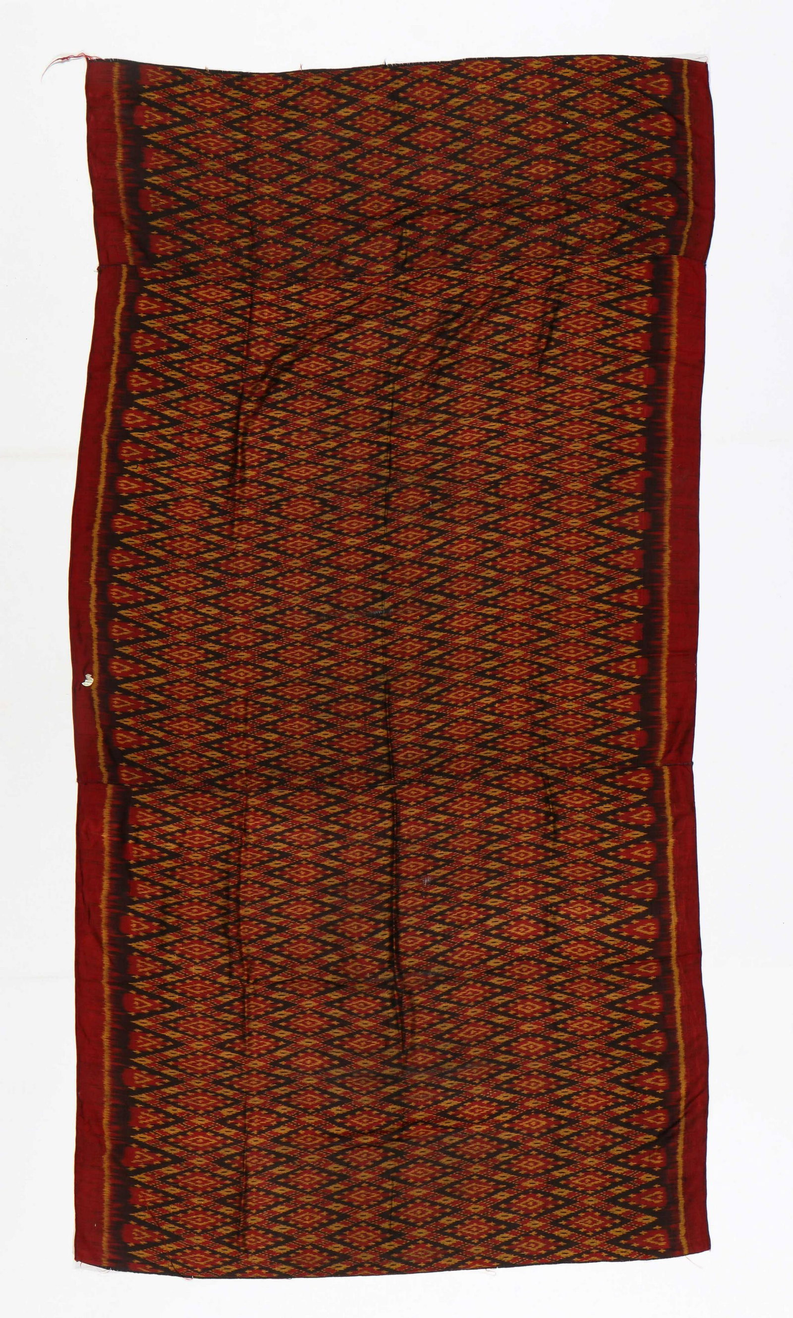 Cambodian Silk Ikat Textile: Cambodian Silk Ikat Textile, 3 panels sewn together, mid 20th c. Size: 69'' x 36'' (175 x 91 cm).