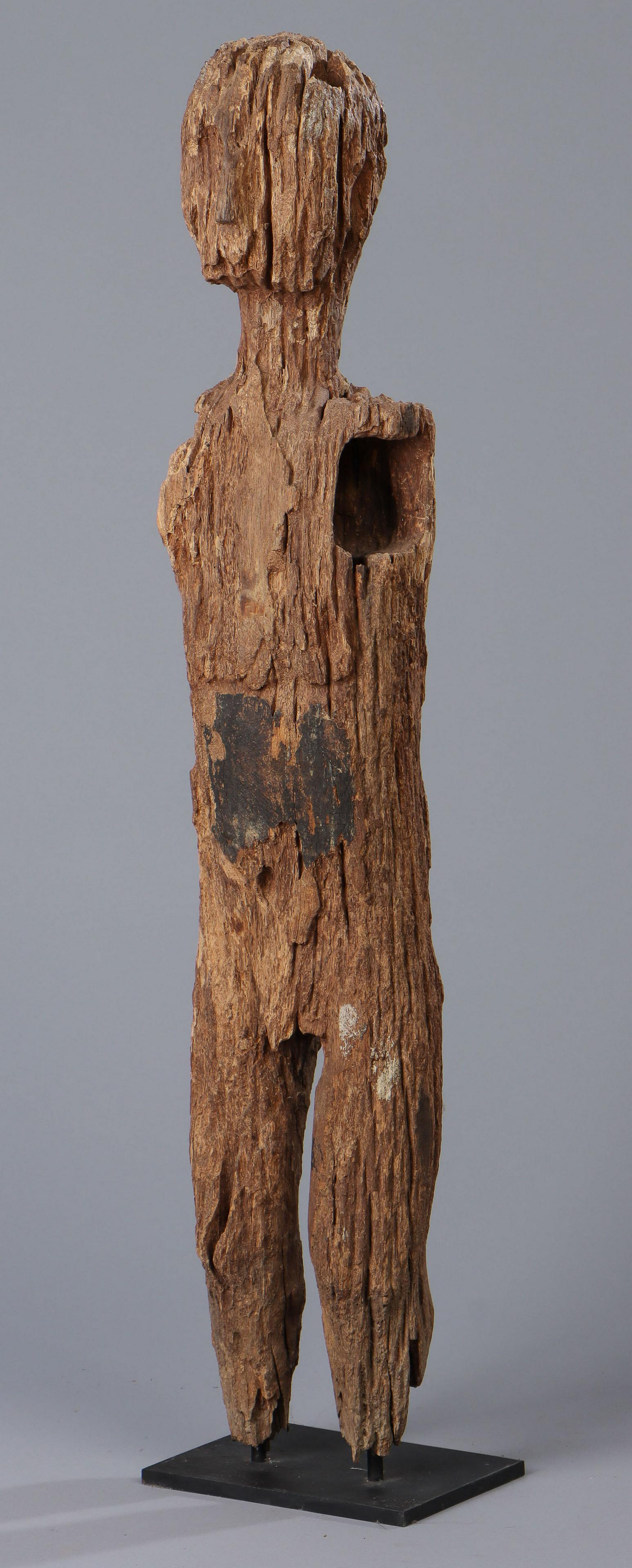 Antique Hampatong Ancestor Figure, Indonesia: Antique Hampatong Ancestor Figure, Indonesia. Carved wood, heavily weathered. Size: 38'' x 7'' x 5'' (97 x 18 x 13 cm); Height on Stand: 36" (91 cm). Ex. Cathryn Cootner Estate Collection, Sonoma, CA.