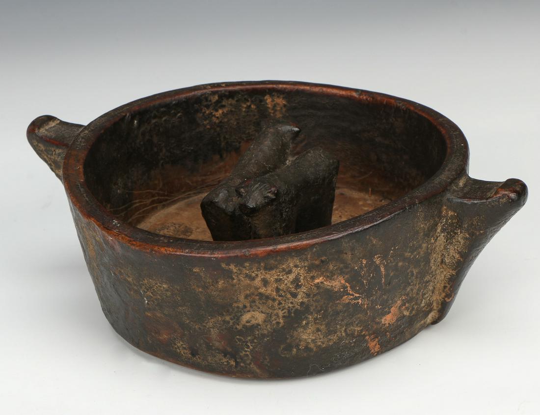 Antique Aymara Marriage Bowl, Bolivia: Antique Aymara Marriage Bowl, Bolivia. Used for drinking chicha or corn beer. Carved wood with rich patina; the interior centering a pair of oxen. Size: 3'' x 9.75'' x 7.5'' (8 x 25 x 19 cm). Ex. Cath