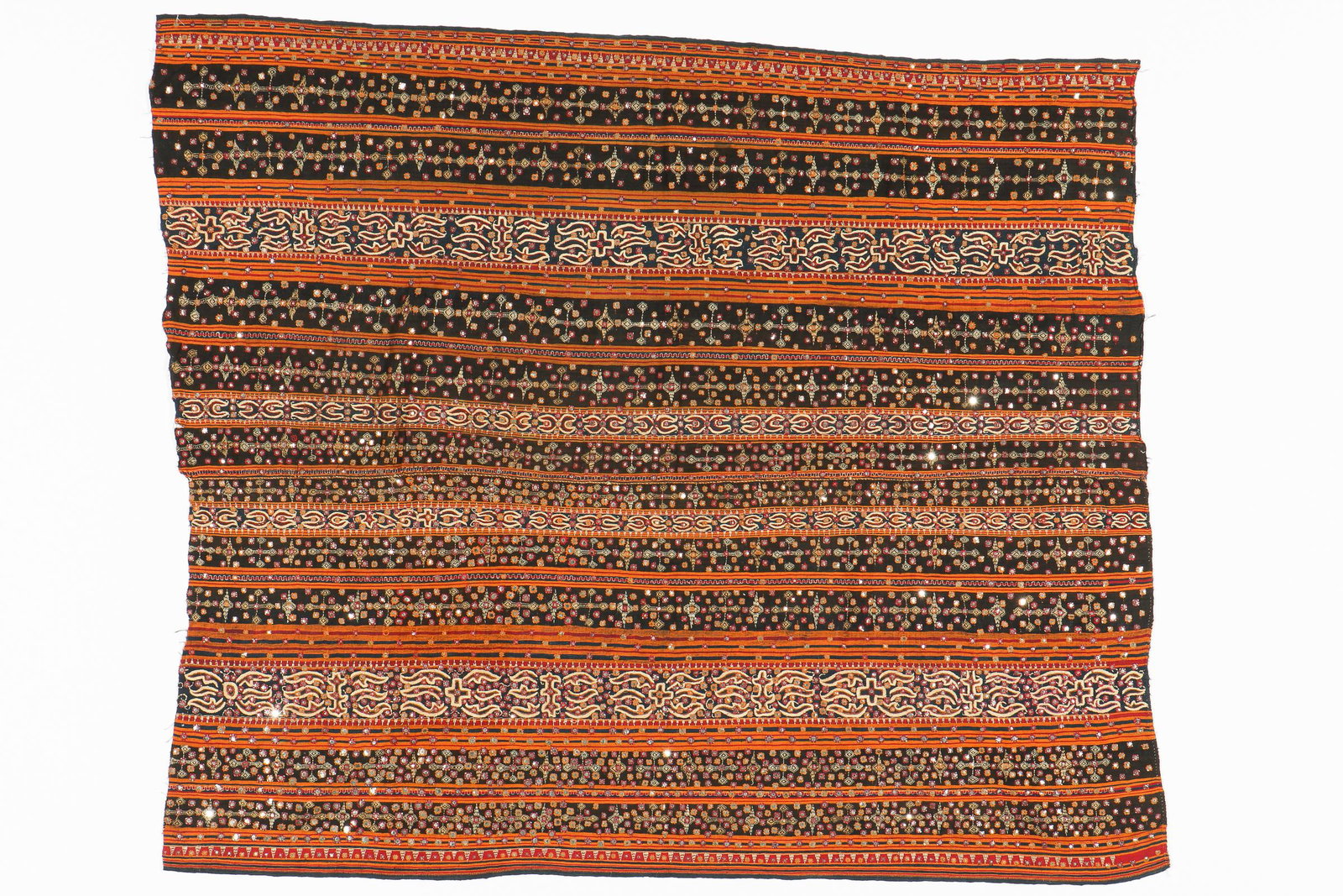 Antique Indonesian Woman's Ceremonial "Tapis Kaca,": Antique Indonesian Woman's Ceremonial "Tapis Kaca," 19th C. Skirt cloth with silk thread, cotton and mica, Krui people, Lampung. Tapis are heavily ornamented ceremonial sarongs made and worn by women 