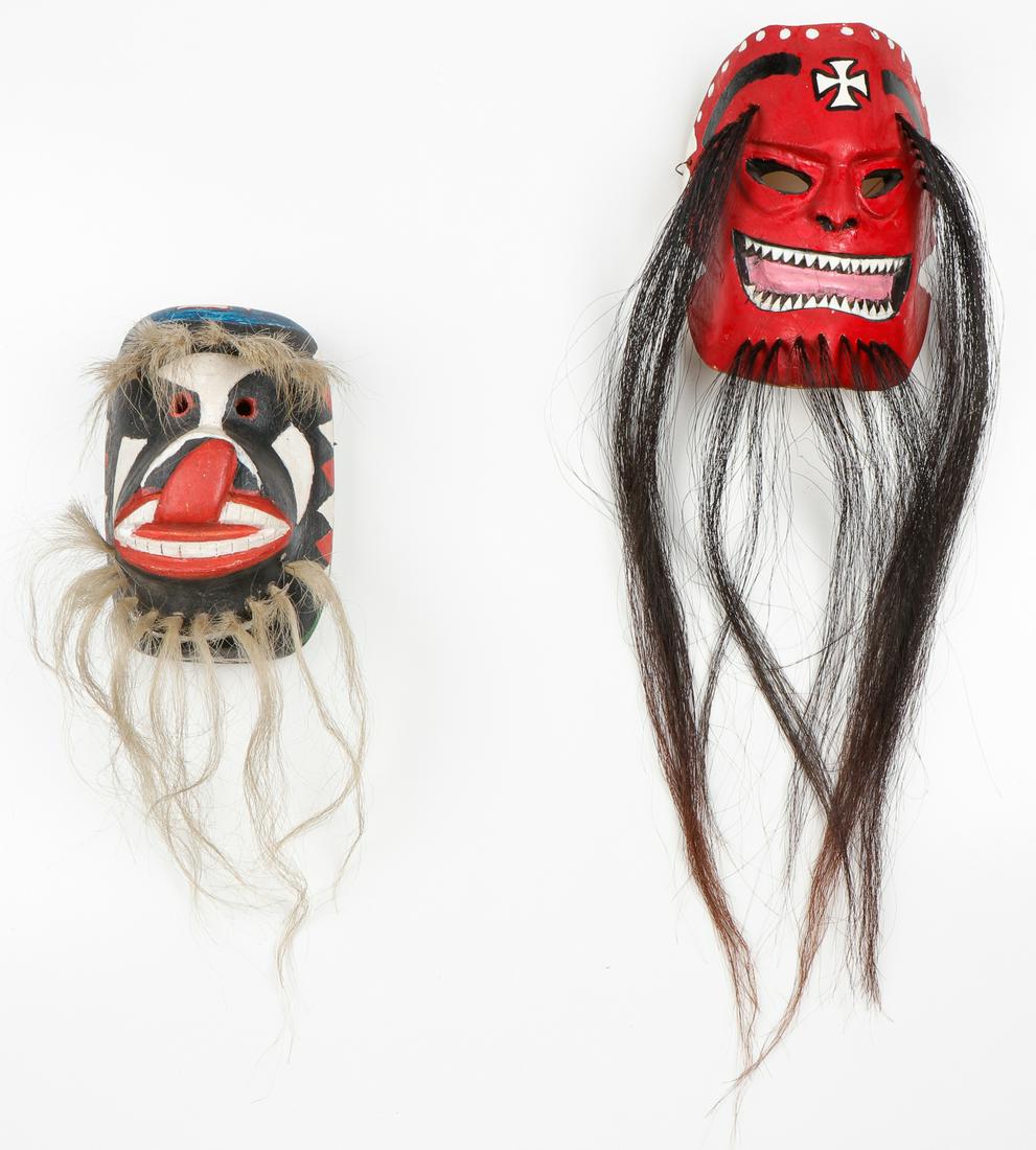 2 Contemporay Yaqui / Mayo Pascola Masks: 2 Contemporay Yaqui / Mayo Pascola Masks. Including a Yaqui mask with tongue out and a Mayo devil mask, Sinaloa. Carved wood, pigment and horse hair. Size: 1) 8'' x 5'' x 5'' (20 x 13 x 13 cm); 2) 8''