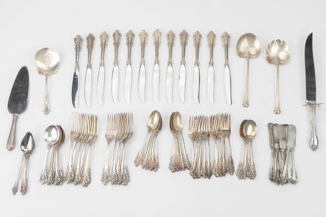 Wallace Grand Baroque Sterling Silver Flatware Service For 12: Wallace Grand Baroque Sterling Silver Flatware Service For 12. Comprised of 12 diner forks, 12 knives, 12 teaspoons, 12 soup spoons, 12 butter knives and 12 salad forks. Plus 6 associated sterling