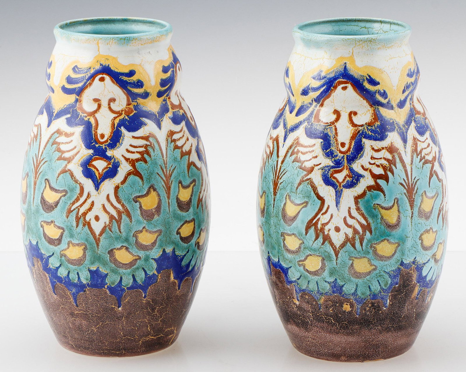 Pair of Dutch Schoonhoven Polychrome Vases: Pair of Dutch Schoonhoven Polychrome Vases. Base inscribed: "No. 5/ Aristo Schoonhoven/ Holland." Ex. Estate Collection Isadore and Nancy Marder, Philadelphia. Size: 13'' x 7'' x 7'' (33 x 18 x 18 cm)
