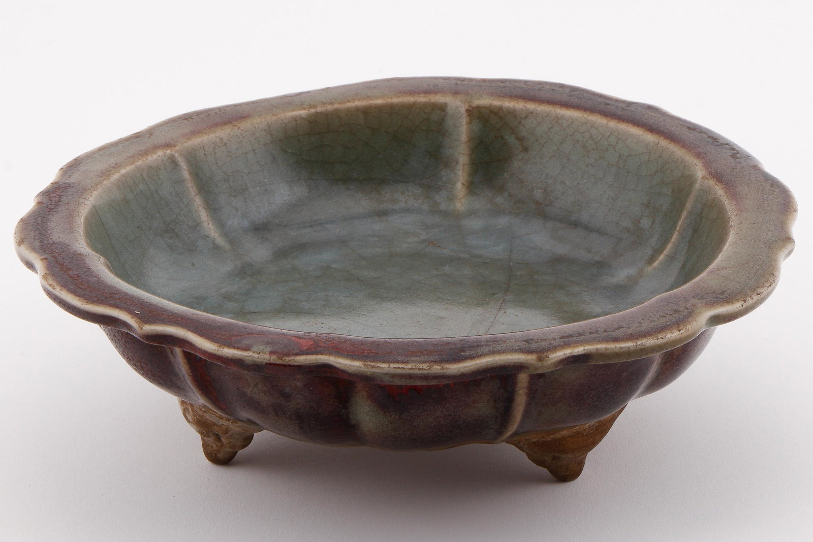 Chinese Footed Bowl: Chinese Footed Bowl. With flat, wide serpentine rim, gourd-form body, on three feet. Unmarked. Size: 9'' x 9'' x 3'' (23 x 23 x 8 cm).