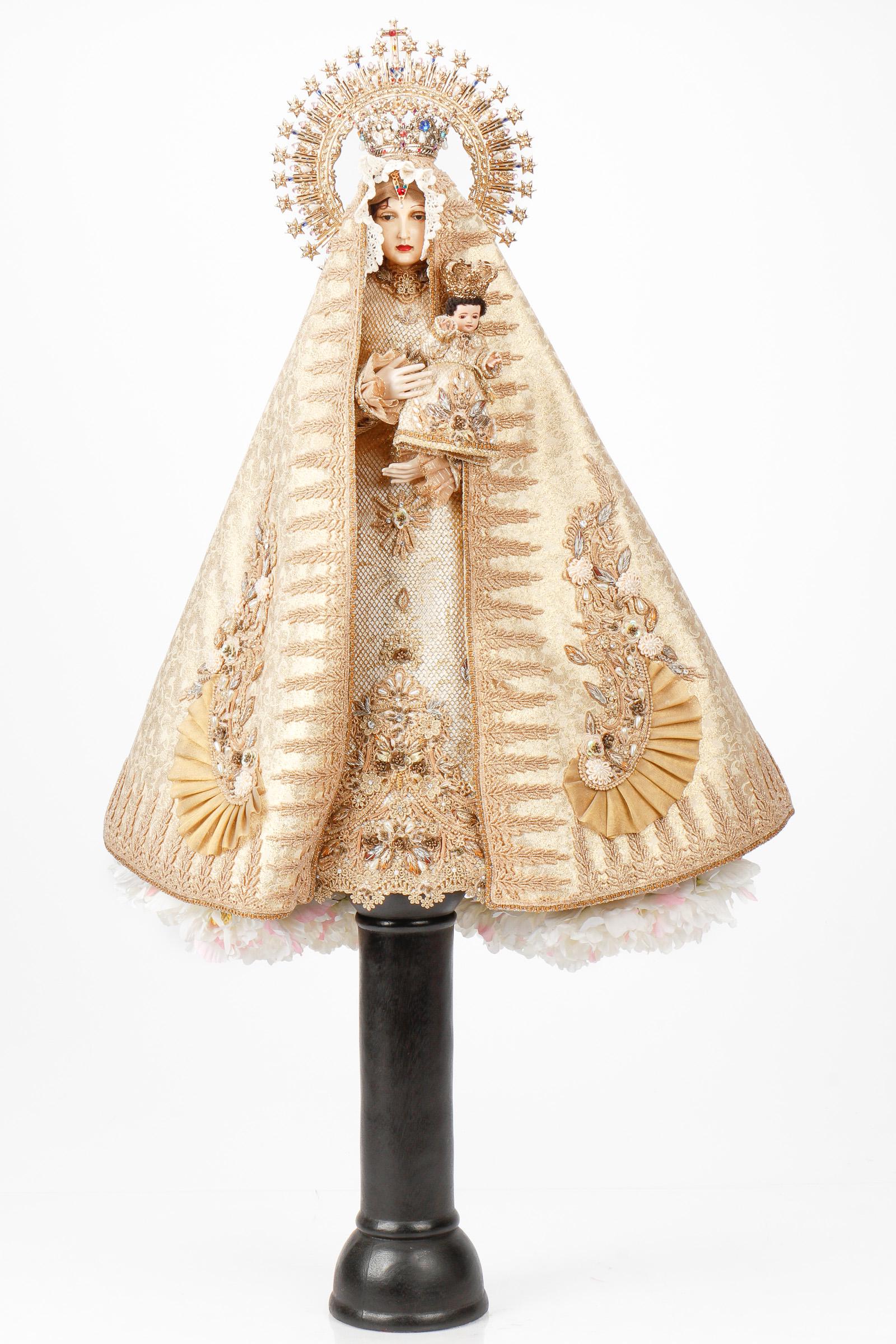 Spanish Colonial Doll of the Madonna and Child: Spanish Colonial Doll of the Madonna and Child. Our Lady figure holding the infant Christ; adorned in crown and resplendor, elaborate embroidered and jeweled robe. Size: 30'' x 26'' x 9'' (76 x 66 x 2
