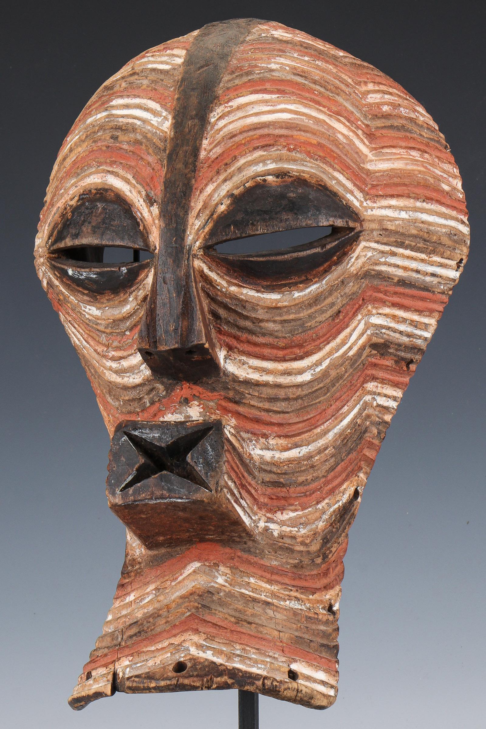 African Songye Kifwebe Dance Mask: African Songye Kifwebe Dance Mask. Carved wood and pigment. Stand not included. Size: 15'' x 8.75'' x 7'' (38 x 22 x 18 cm). Ex. Collection William and Diane Bousquette, Purchase, New York.