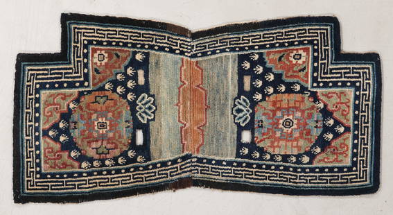 Saddle Rug, Tibet, Mid 19th C., 2'2'' x 4'4'': Saddle Rug, Tibet, Mid 19th C., 2'2'' x 4'4'' (66 x 132 cm). Weight: 5 lbs. Material: wool pile, wool warp, wool weft. An excellent example of a mid 19th century saddle rug. The weaverâ€™s