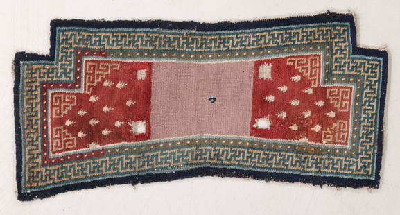 Saddle Rug, Tibet, Early/Mid 19th C., 2'1'' x 4'3'': Saddle Rug, Tibet, Early/Mid 19th C., 2'1'' x 4'3'' (64 x 130 cm). Weight: 5 lbs. Material: wool pile, wool warp, wool weft. Woven as a single piece. Typically, Tibetan saddle carpets are woven as two