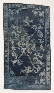 Indigo Lotus Khaden Rug, Tibet, Late 19th C., 2'9'' x 5'0'': Indigo Lotus Khaden Rug, Tibet, Late 19th C., 2'9'' x 5'0'' (84 x 152 cm). Weight: 6 lbs. Material: wool pile, wool warp, wool weft.