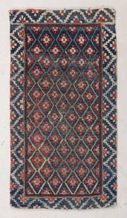 Indigo Lattice Khaden Rug, Tibet, Late 19th/Early 20th C.: Indigo Lattice Khaden Rug, Tibet, Late 19th/Early 20th C., 2'6'' x 4'9'' (76 x 145 cm). Weight: 5 lbs. Material: wool pile, wool warp, wool weft. An unusual example with banded colored warps.