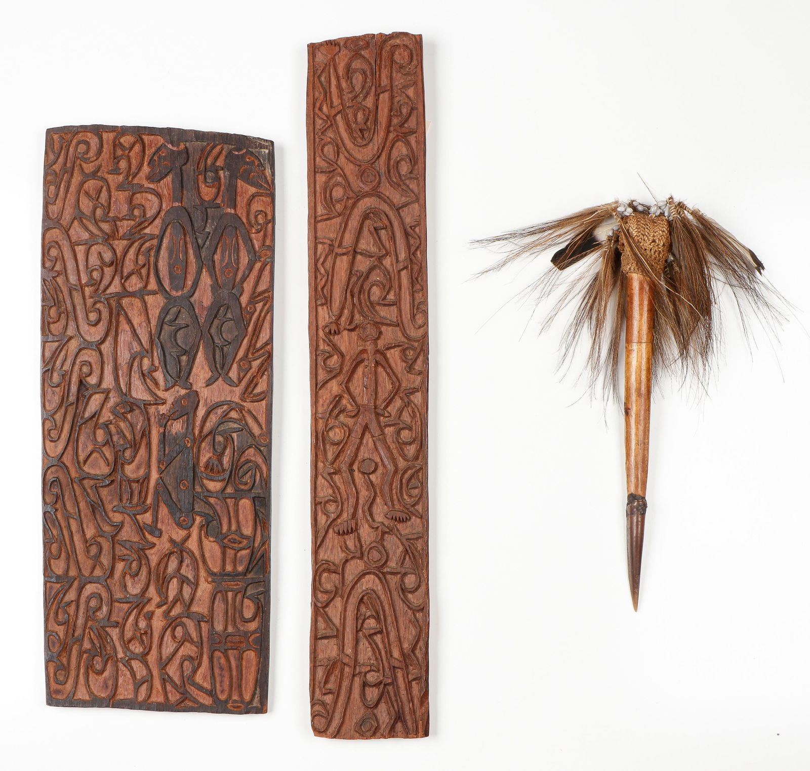 3 Asmat Artifacts, PNG: 3 Asmat Artifacts, PNG. Including a fine Asmat carved clan panel w/ 3 ancestor figures, another slender example w/ single figure. Together with an Asmat cassowary bone dagger. Ex. Collection of George