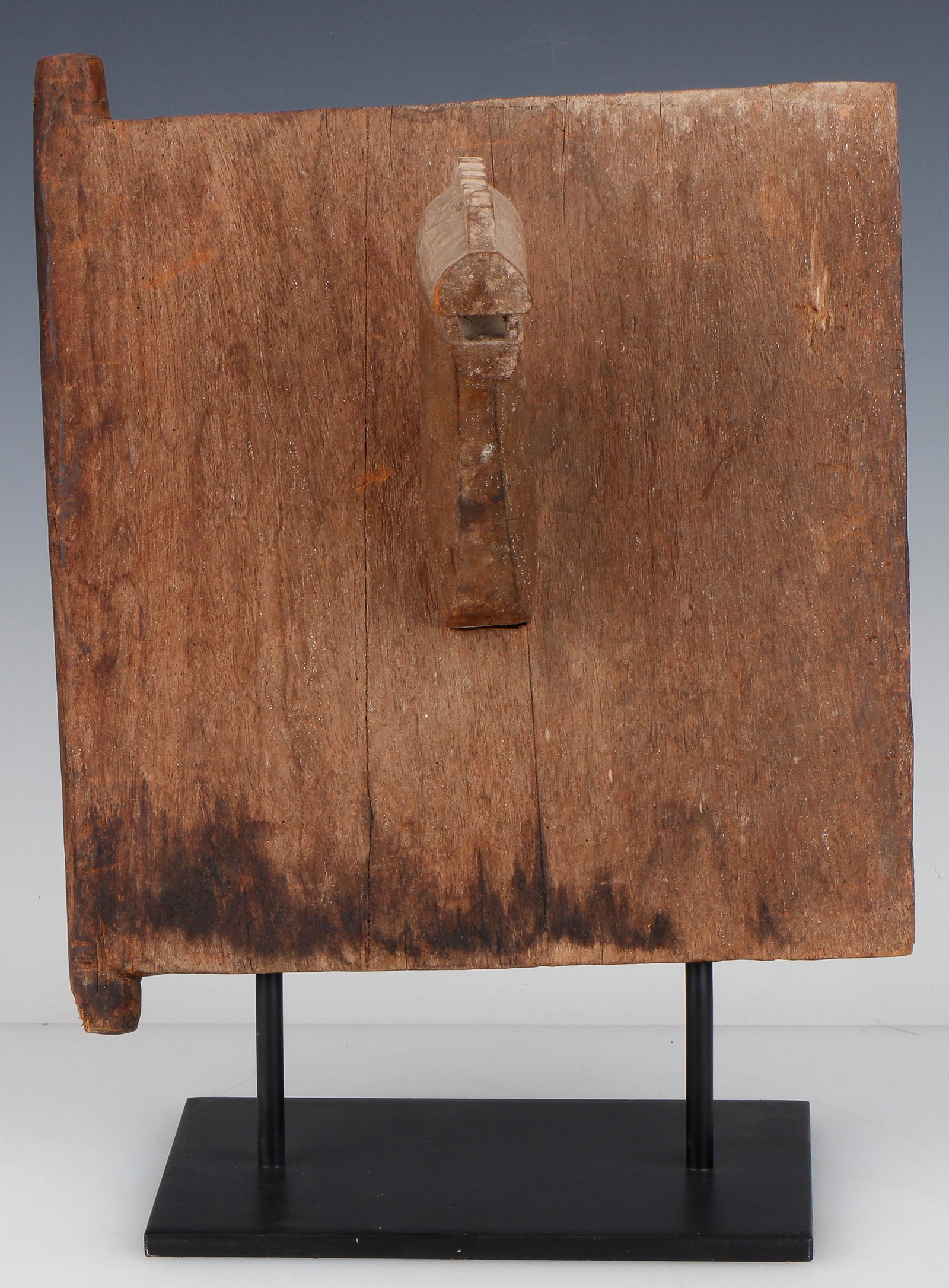 Toraja Granary Door with Animal Head: Toraja Granary Door with Animal Head. carved wood, old patina. On stand. Size: 14'' x 12'' x 11'' (36 x 30 x 28 cm). Height on stand: 15" (38 cm).