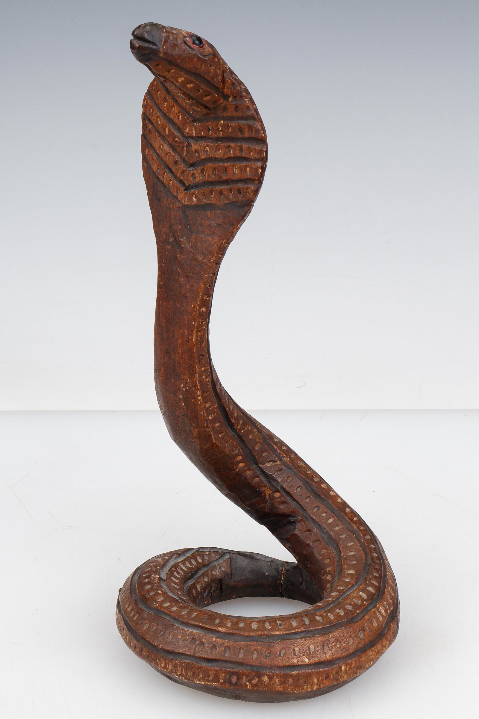Burmese Carved Wood Cobra: Burmese Carved Wood Cobra. With inset bead eyes. Size: 12'' x 5.25'' x 5'' (30 x 13 x 13 cm).