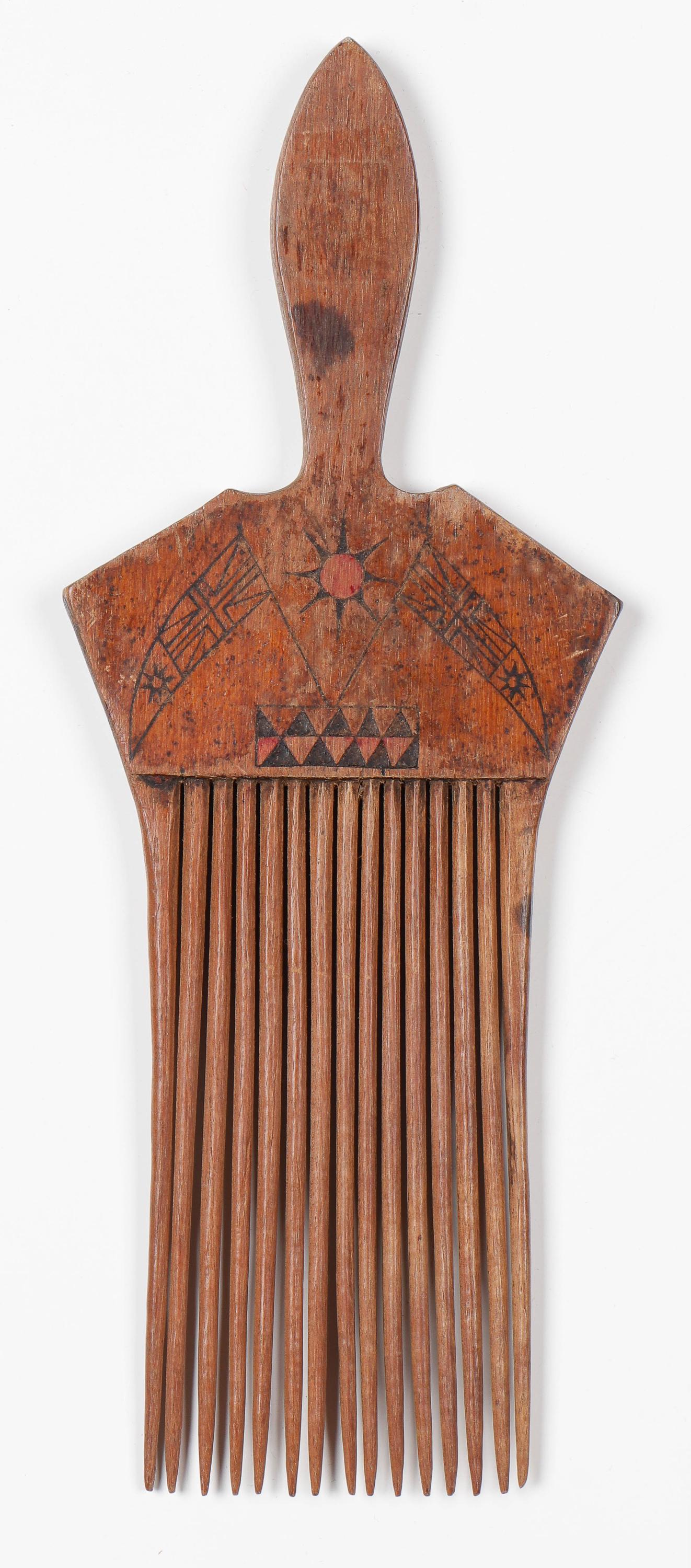 Polynesian Comb: Polynesian Comb. Possibly Cook Islands flag incised decoration. From the collection of Joseph Salamanca. Size: 11'' x 4.25'' x .5'' (28 x 11 x 1 cm).