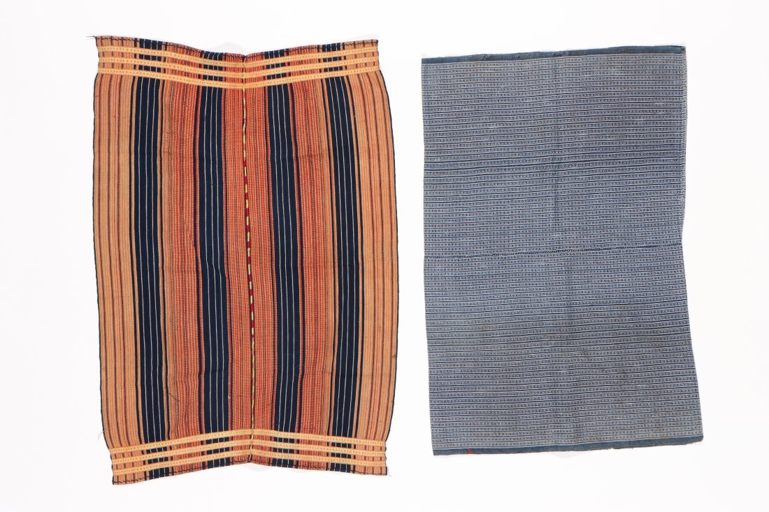 2 Vintage Woven Cotton "Tapis", Philippines, Mid 20th C.: 2 Vintage Woven Cotton "Tapis", Philippines, Mid 20th C. Including 1 Mangyan tubeskirt with indigo dyes, and a cotton skirt from Northern Philippines, either Ga'dang or Bontoc. Size: 1) 36'' x 25'', (