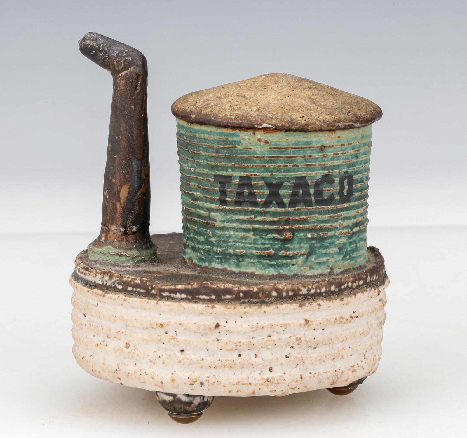 Dan Anderson, (American, b. 1945) "Taxaco Ewer": Dan Anderson, (American, b. 1945) "Taxaco Ewer", glazed stoneware, unsigned. Repaired. Size: 4.75'' x 5.25'' x 5'' (12 x 13 x 13 cm). Provenance: The Jimmy and Angela Clark Collection, Philadelphia.
