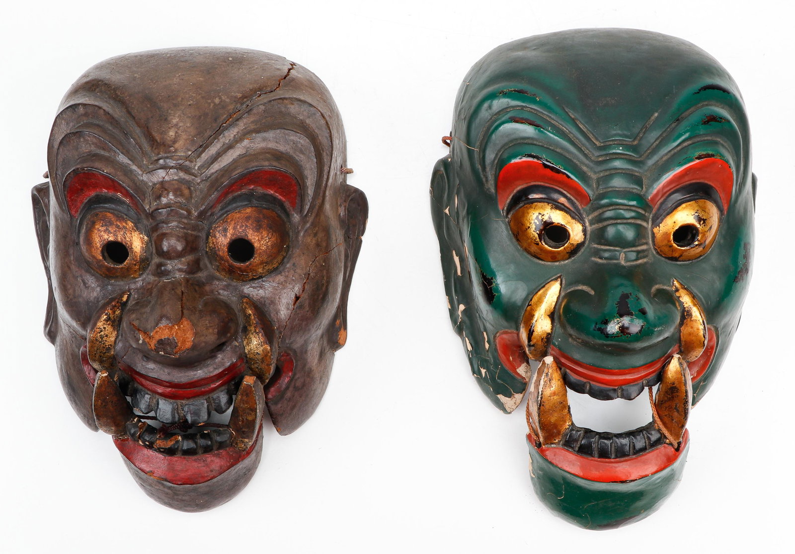 2 Antique Japanese Lacquer Gigaku Masks: 2 Antique Japanese Lacquer Gigaku Masks. With articulated jaws. Size: 11'' x 8'' x 5'' (28 x 20 x 13 cm). Provenance: Sylvia and Philip Chaplain Collection, New Hampshire.
