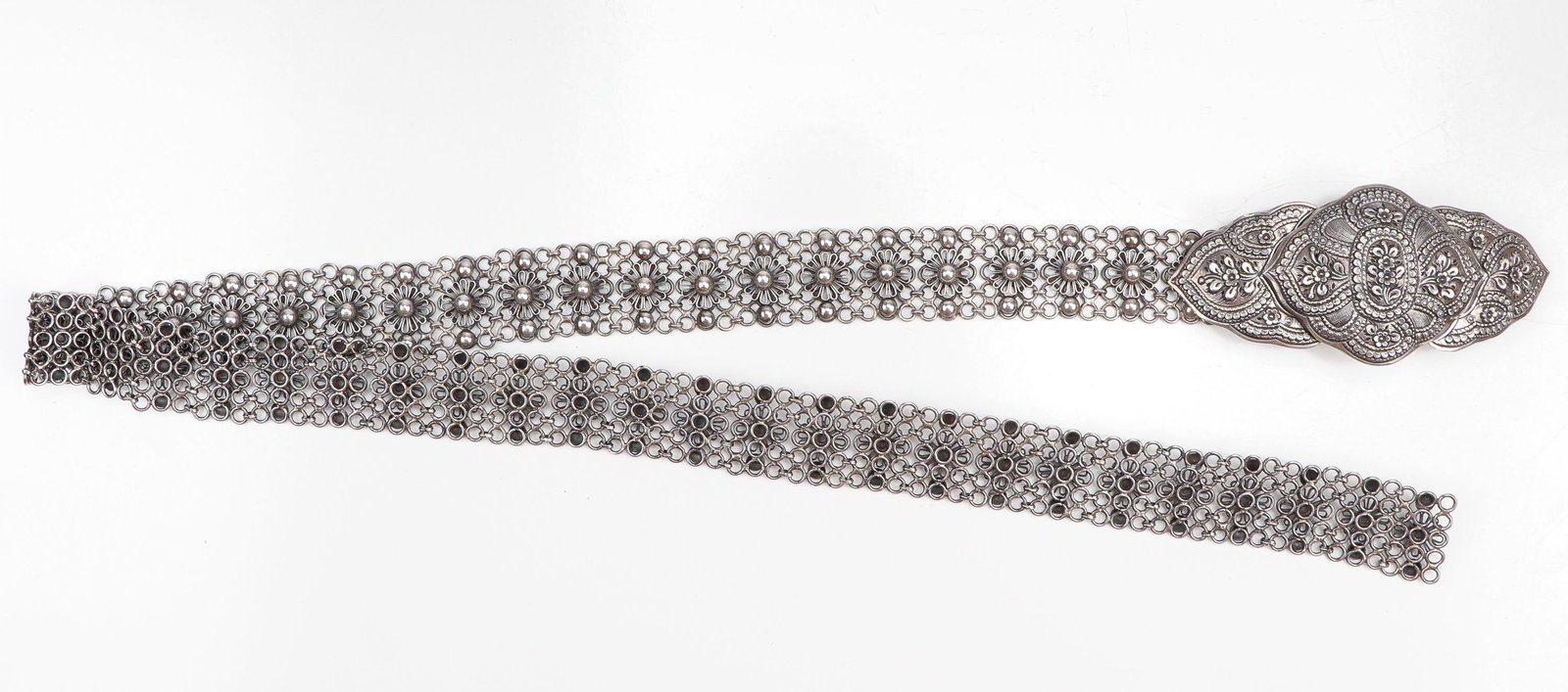 Malay Straights Chinese Silver Belt and Buckle, C.1900: Malay Straights Chinese Silver Belt and Buckle, C.1900. Size: Belt: 36" (91 cm); Buckle: 5'' x 2.25'' x '' (13 x 6 x cm); Weight: 12.8 ozt. Provenance: Sylvia and Philip Chaplain Collection, New Hamps