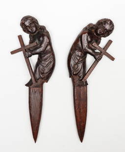 Two 19th C. European Figural Vampire Slayer Stakes: Two 19th Century European Figural Vampire Slayer Stakes, carved wood. Comprised of two antique cherub figures with acanthus-form skirts, later fitted with crosses and stakes. Each size: 21'' x 8'' x